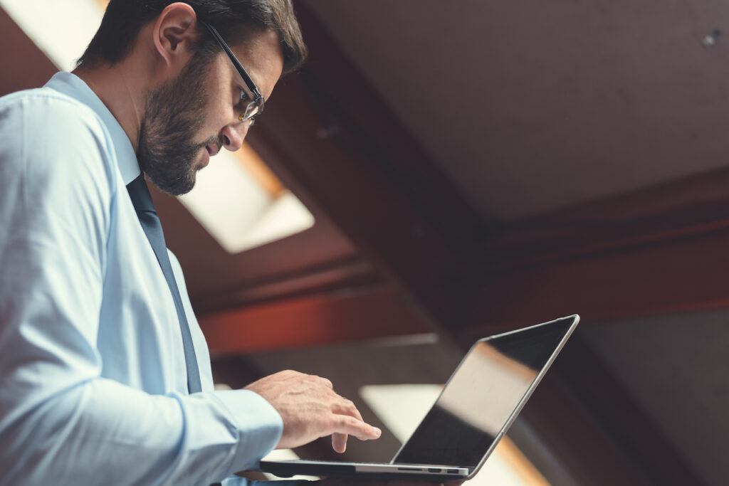 professional IT services technician assisting with cybersecurity setup