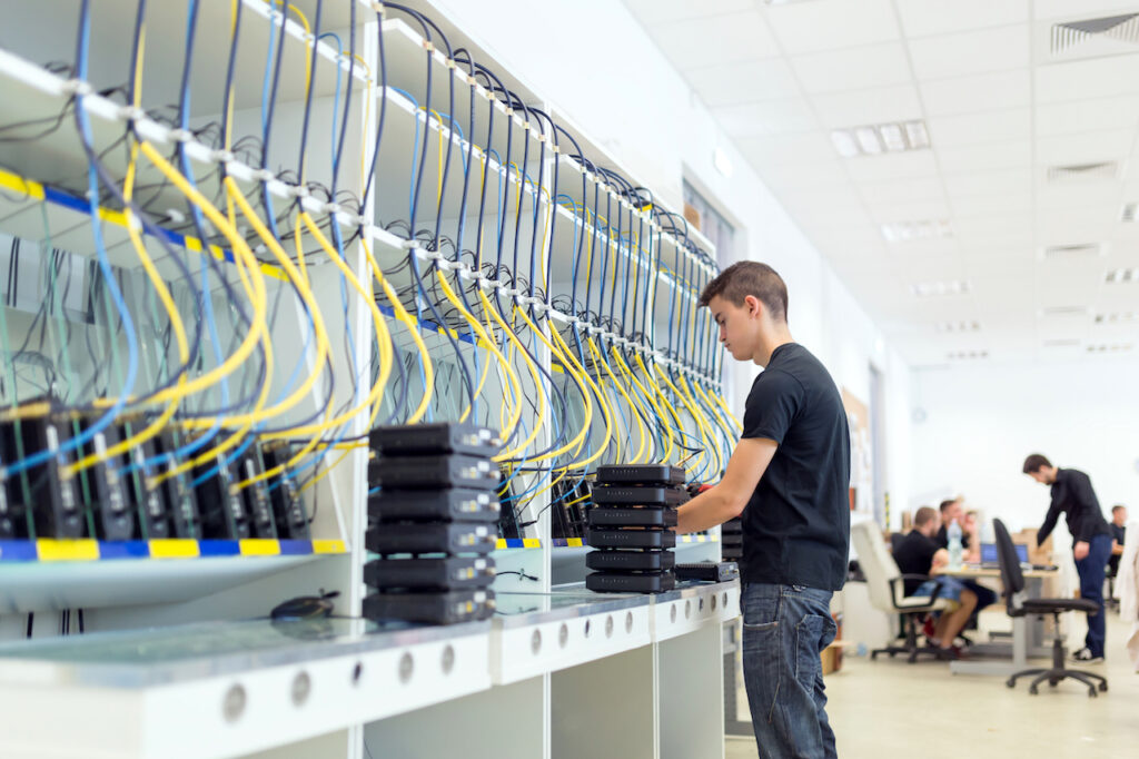 Local IT provider testing the network hardware at a business