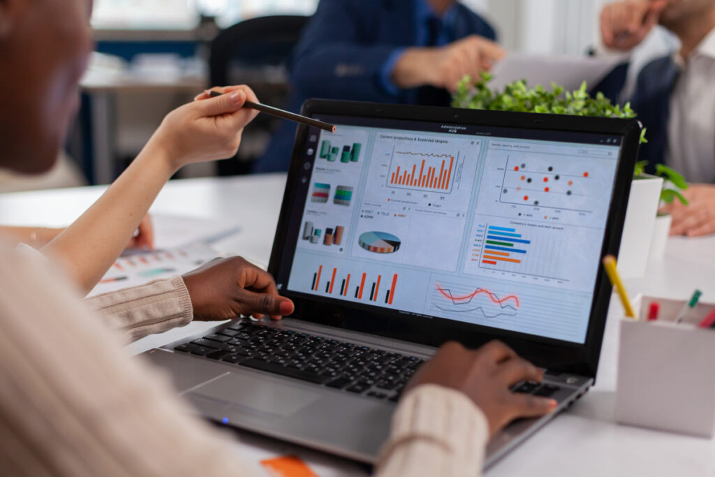 A laptop screen showing different data charts for data storage